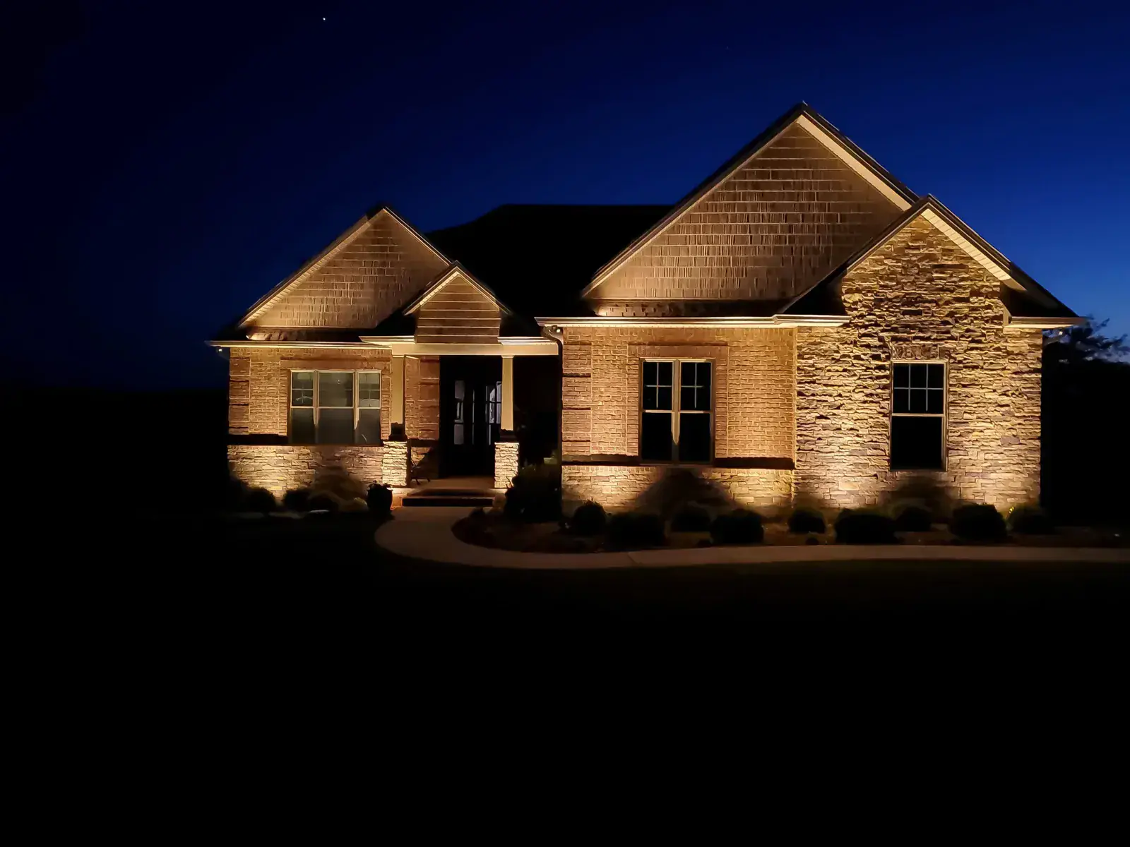 Warm up-lighting on a single-story home, Burns