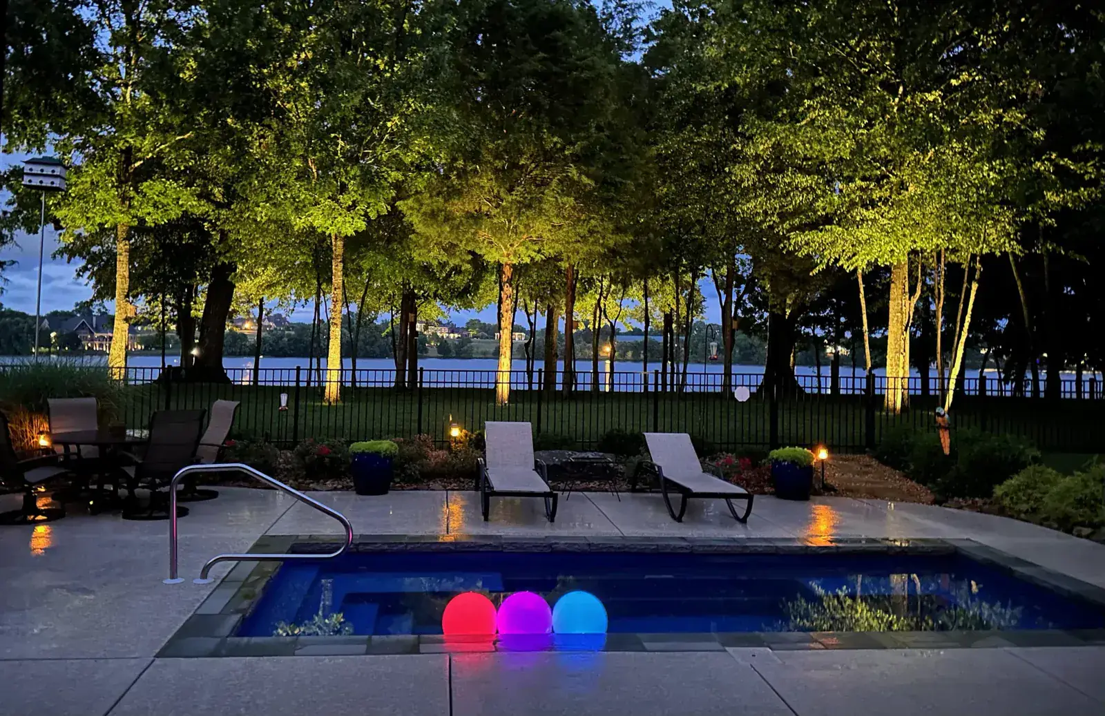 Pool and landscape lighting at dusk
