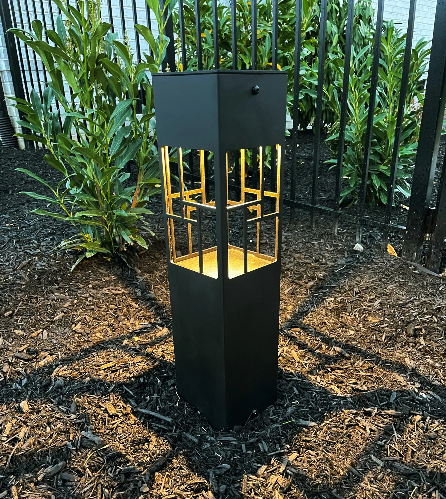 Path and bollard lighting in a garden