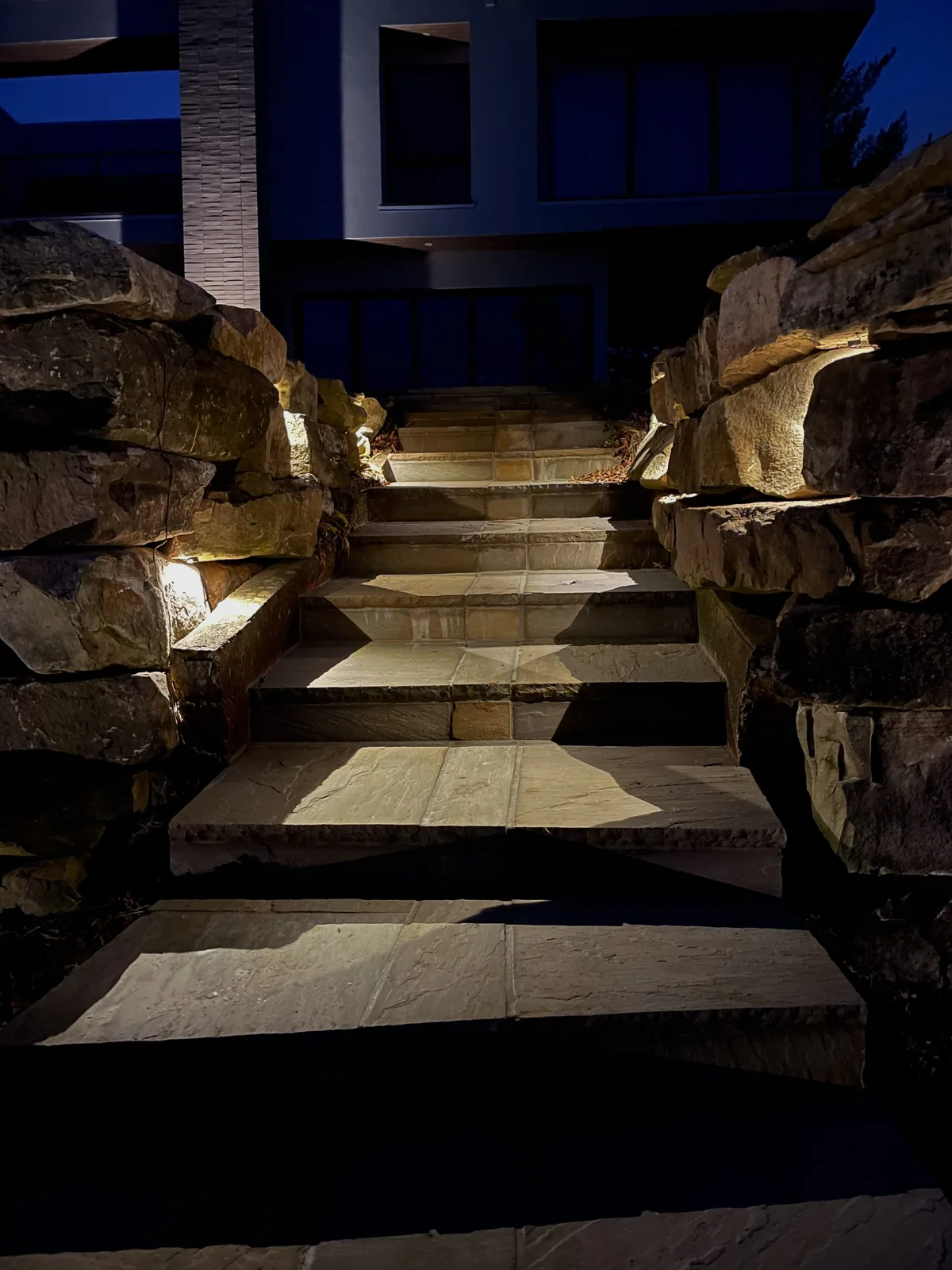 Step and path lighting on a stone staircase