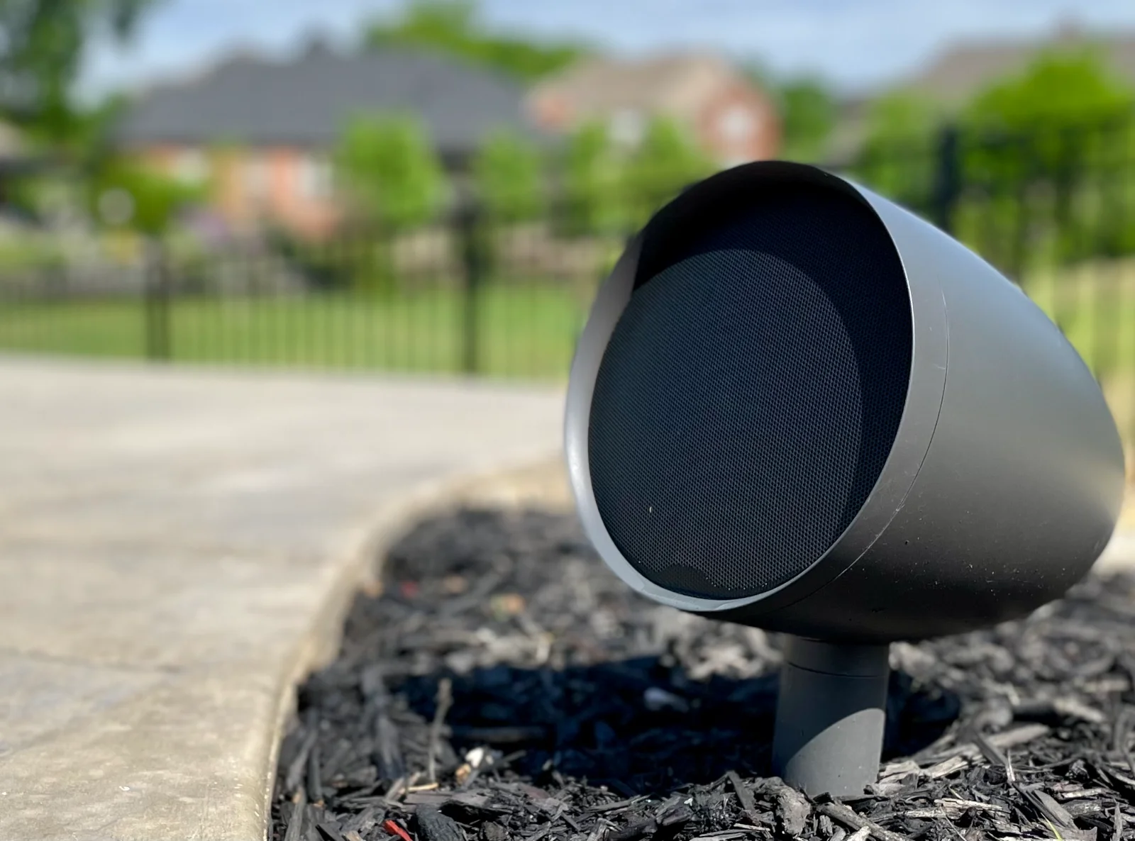 Outdoor audio speaker fixture in a Middle Tennessee landscape